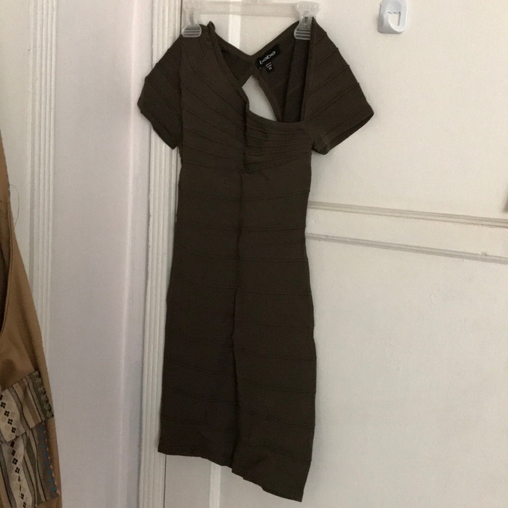 BEBE Green mini bandage Dress .